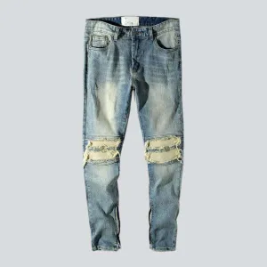 Distressed knees jeans for men